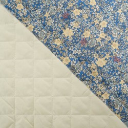 Matelassé de coton, fleur et unis tons bleu et ivoire